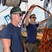 Navy Divers Repair USS Iwo Jima