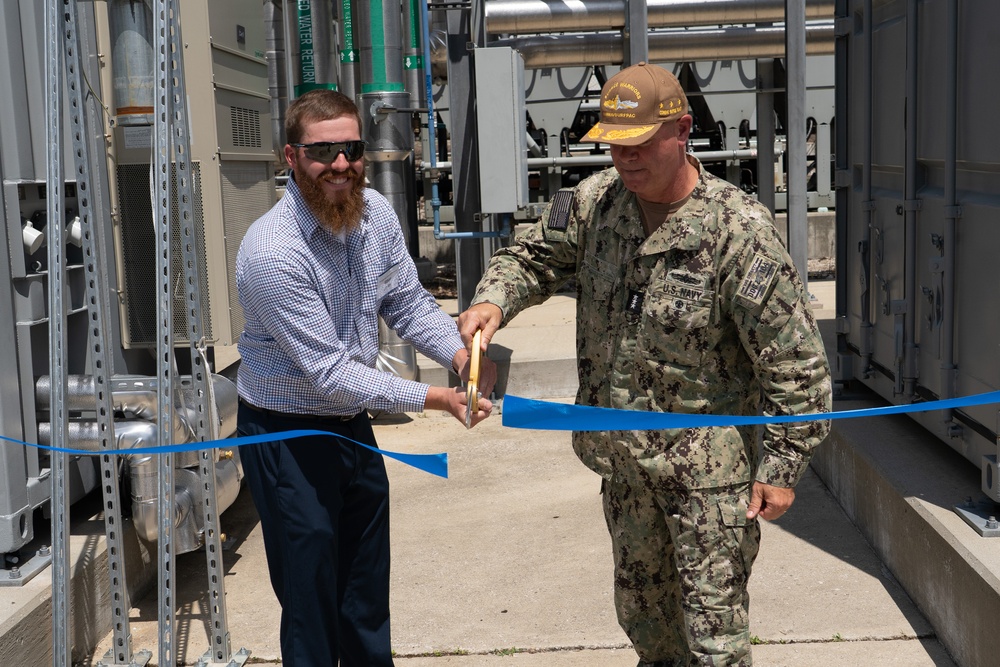CRANE, Ind. — Vice Admiral Brendan McLane, Commander, Naval Surface Forces and Commander, Naval Surface Force, Pacific Fleet and Ethan Jones,