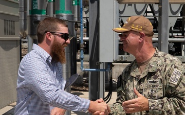 CRANE, Ind. — Vice Admiral Brendan McLane, Commander, Naval Surface Forces and Commander, Naval Surface Force, Pacific Fleet and Ethan Jones,