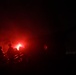 Gun Devils fire artillery at night during Devil Avalanche