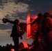 Gun Devils fire artillery at night during Devil Avalanche