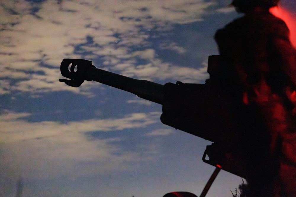Gun Devils fire artillery at night during Devil Avalanche