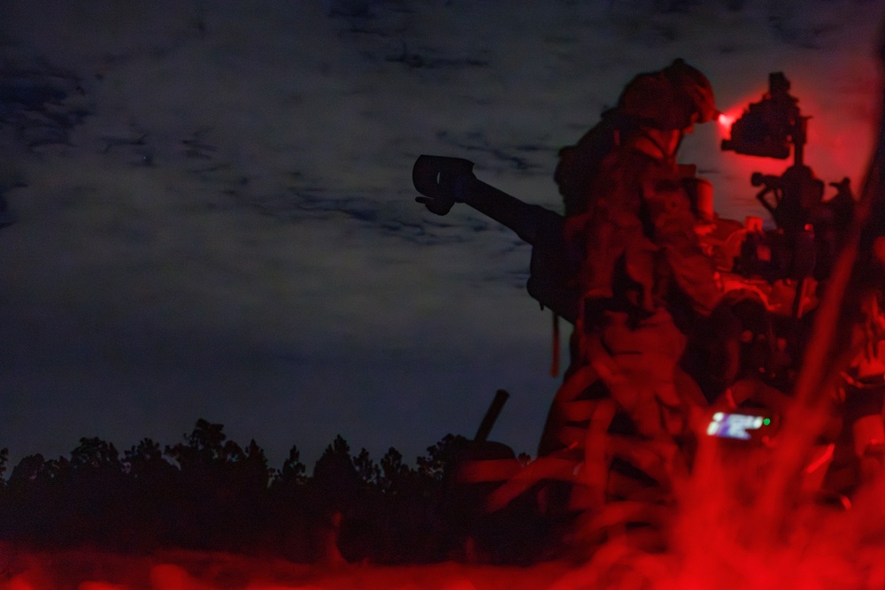 Gun Devils fire artillery at night during Devil Avalanche