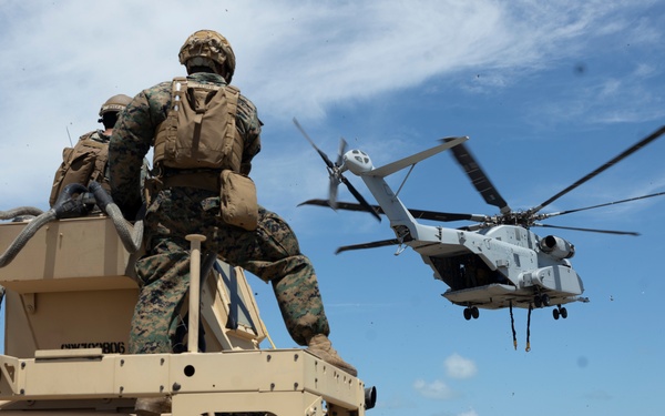 U.S. Marines with 2nd DSB execute external lifts with a JLTV