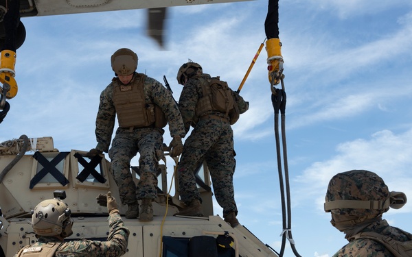 U.S. Marines with 2nd DSB execute external lifts with a JLTV