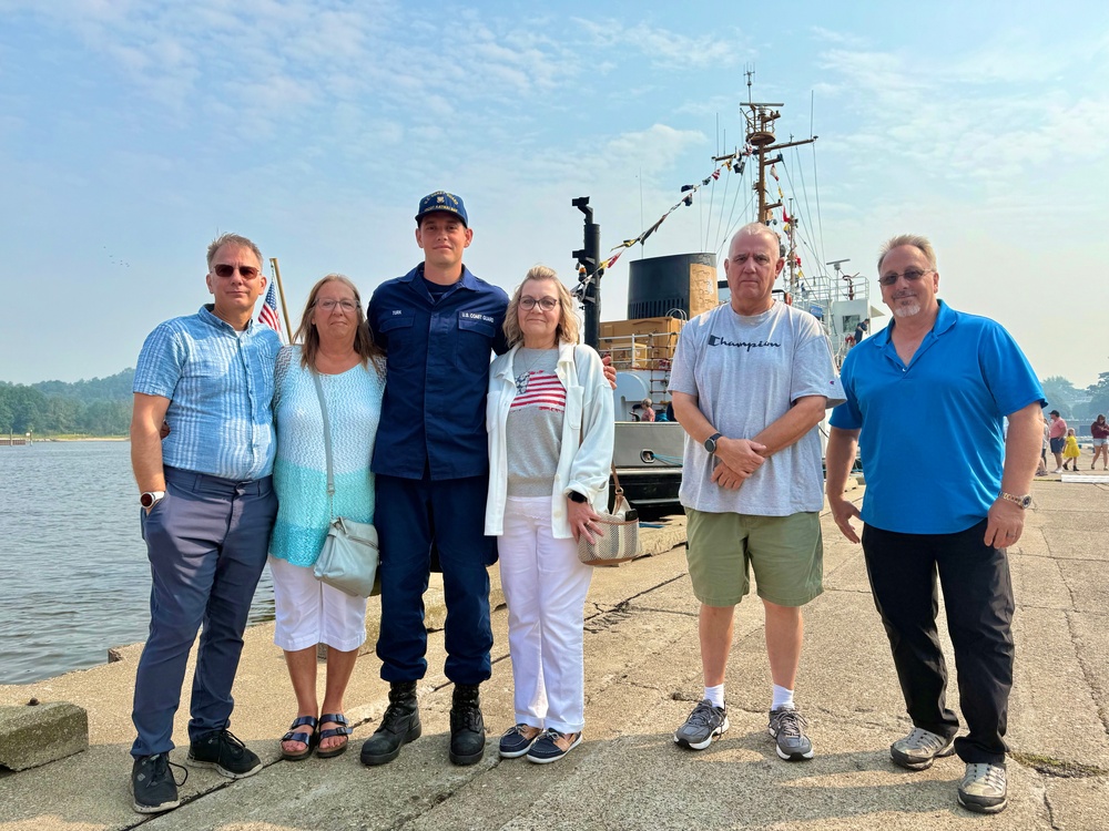 Coast Guardsman reunites with rescued 97-year-old man and his family
