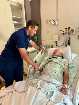 Coast Guardsman reunites with rescued 97-year-old man and his family