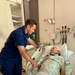 Coast Guardsman reunites with rescued 97-year-old man and his family