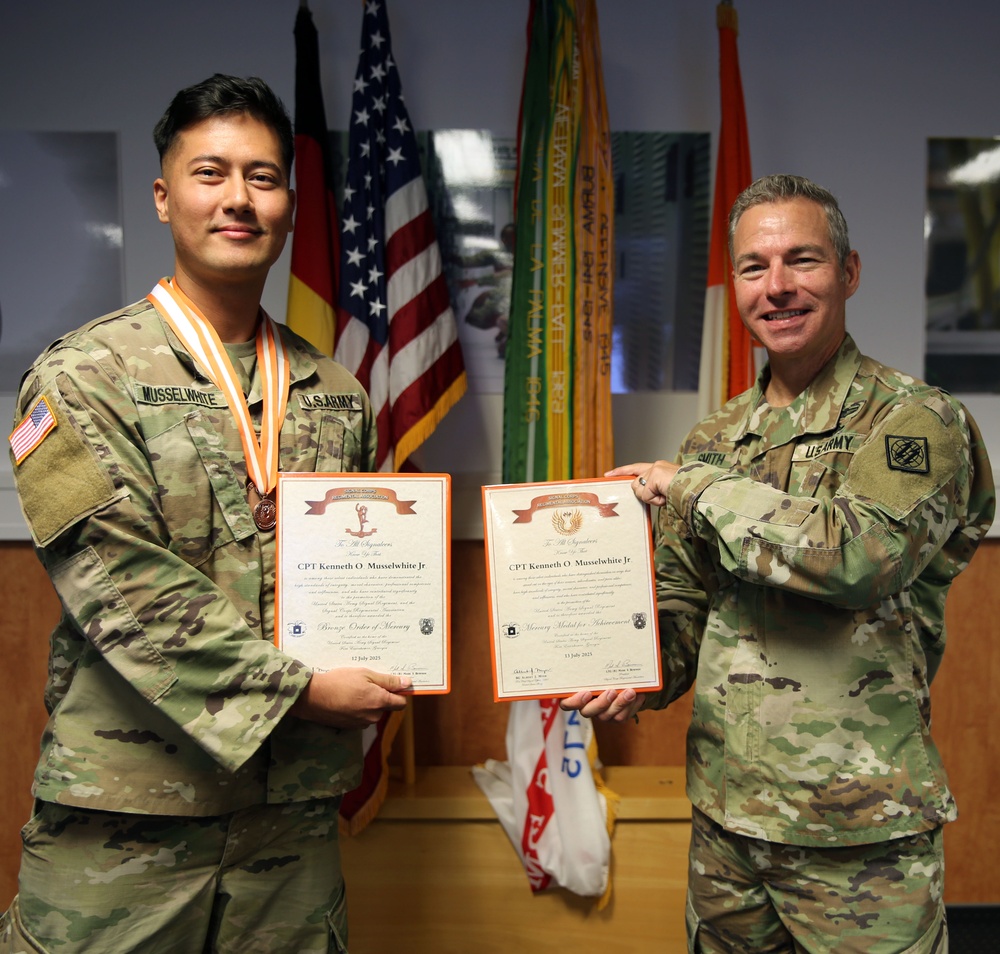 Signal Officer receives Bronze Order of Mercury, Mercury Achievement Medal