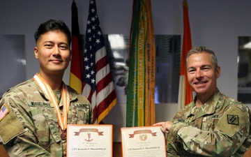 Signal Officer receives Bronze Order of Mercury, Mercury Achievement Medal