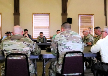 Fort McCoy Garrison, tenant organization team members share ideas in August 2025 meeting