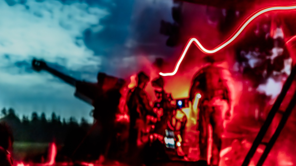 Gun Devils fire M777 155mm howitzer artillery at night during Devil Avalanche