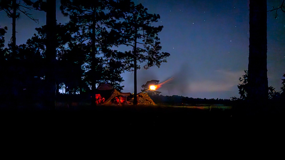 Gun Devils fire M777 155mm howitzer artillery at night during Devil Avalanche