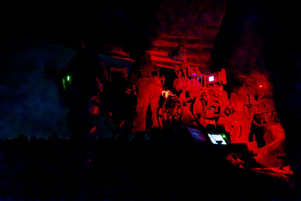 Gun Devils fire M777 155mm howitzer artillery at night during Devil Avalanche