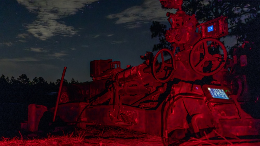 Gun Devils fire M777 155mm howitzer artillery at night during Devil Avalanche