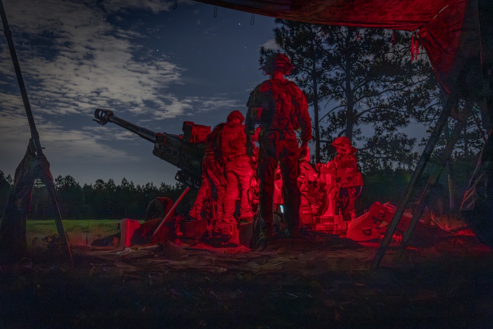 Gun Devils fire M777 155mm howitzer artillery at night during Devil Avalanche