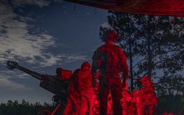 Gun Devils fire M777 155mm howitzer artillery at night during Devil Avalanche