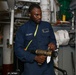 Sailors aboard the USS John Finn conduct an engineering training team drill in the Indian Ocean