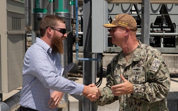 CRANE, Ind. — Vice Admiral Brendan McLane, Commander, Naval Surface Forces and Commander, Naval Surface Force, Pacific Fleet and Ethan Jones