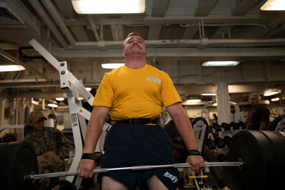 USS Kearsarge Sailors Participate In Weightlifting Competition.