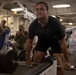 USS Kearsarge Sailors Participate In Weightlifting Competition.