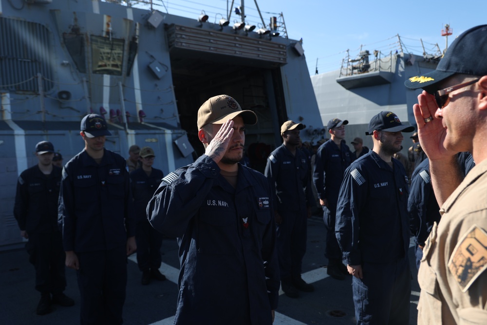 DC1 Fischer Salutes CDR Timpner, Commanding Officer of USS FARRAGUT