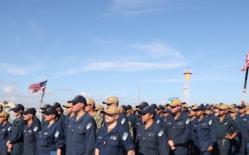 Crew of USS FARRAGUT Stand at Attention as Awardees Fall Back into Formation