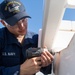 Reagan Sailors perform maintenance