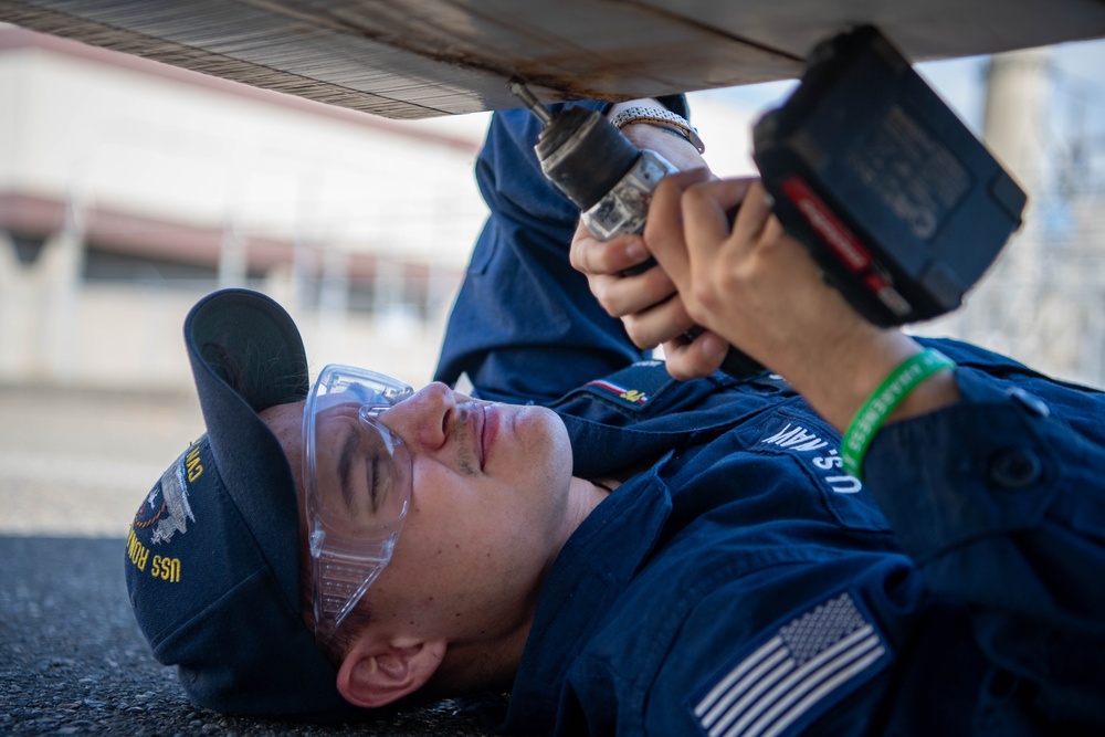 Reagan Sailors perform maintenance