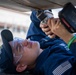 Reagan Sailors perform maintenance