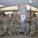 Leadership and staff from the 60th Medical Group join representatives from the American Red Cross to unveil the new Sensory Simulation Cart