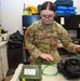 A1C Ownbey perfroms testing on a gas mask