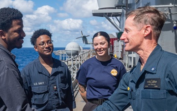 Commander, Task Force 76, Visits Fueling at Sea Station aboard USS America (LHA 6)