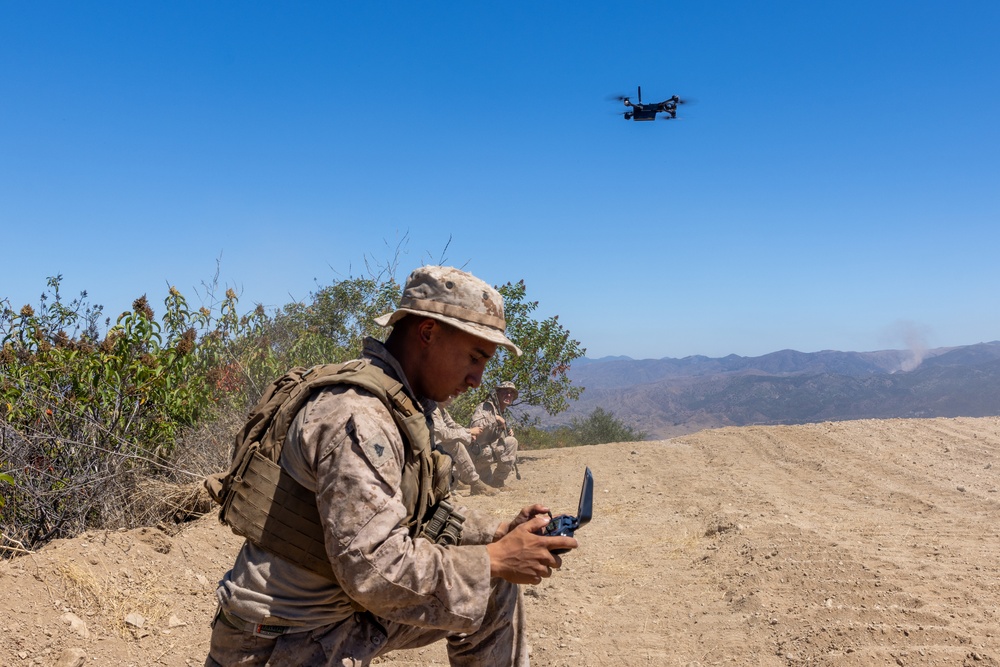 Marines fly a Skydio drone during a battalion field exercise