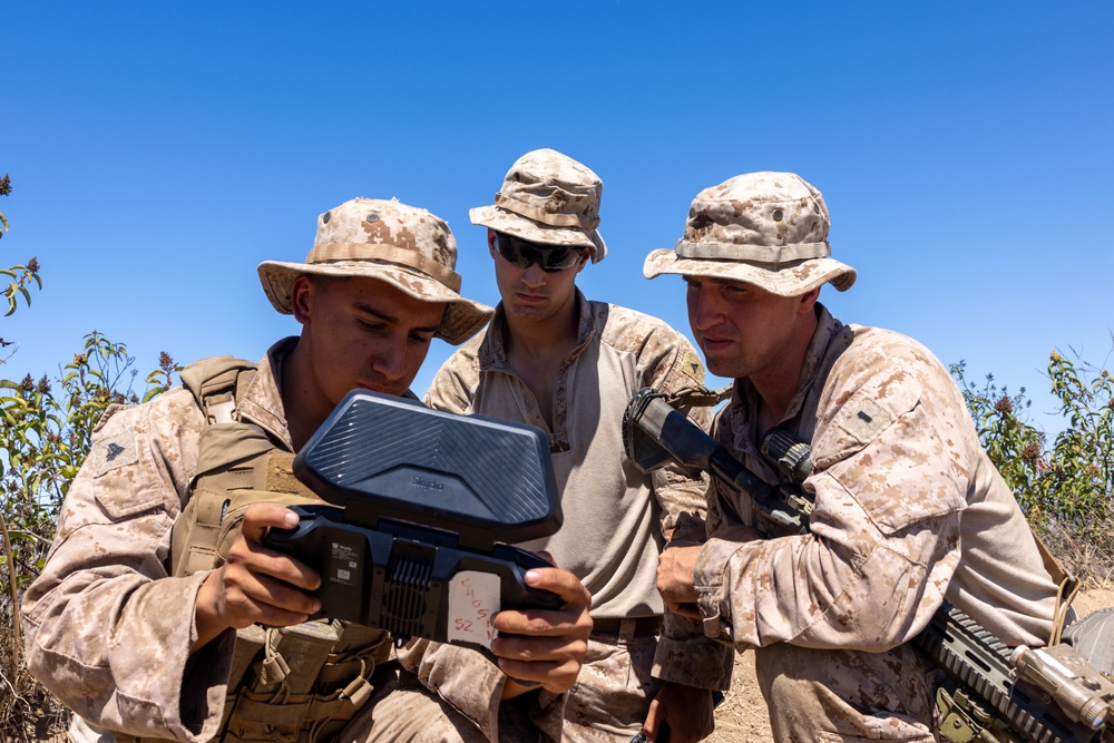 Marines fly a Skydio drone during a battalion field exercise