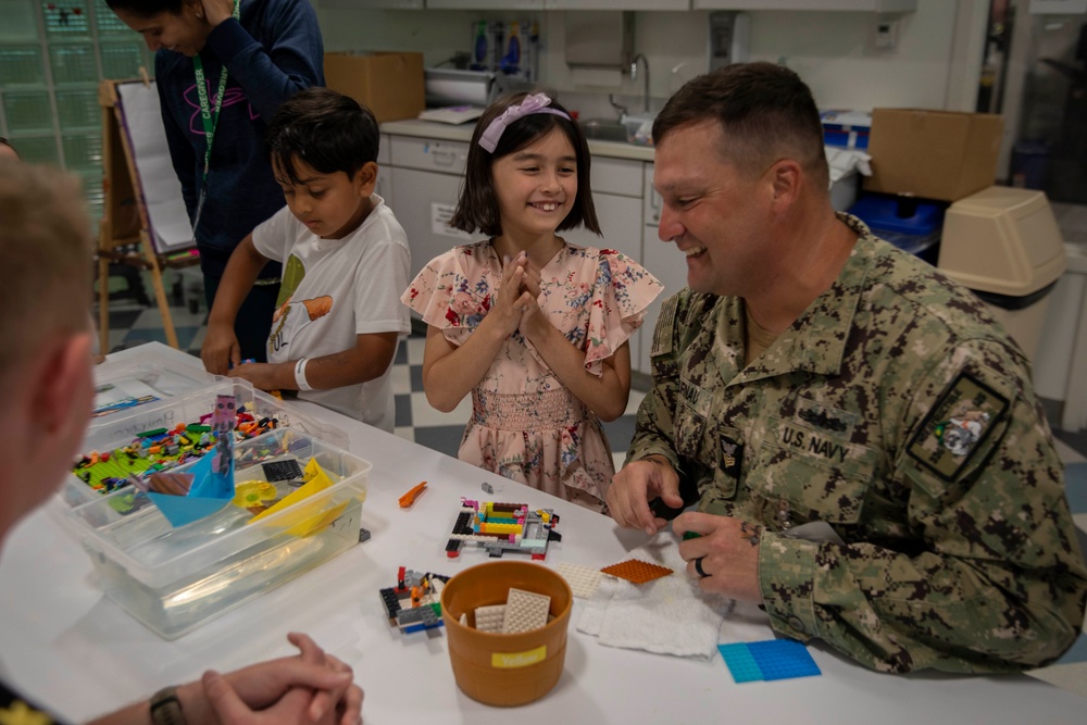 Two Sailors and a Marine visit the Seattle Children’s Hospital