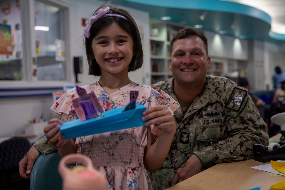 Two Sailors and a Marine visit the Seattle Children’s Hospital