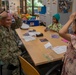 Two Sailors and a Marine visit the Seattle Children’s Hospital