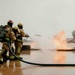 Fire Emergency Services train in live fire simulation