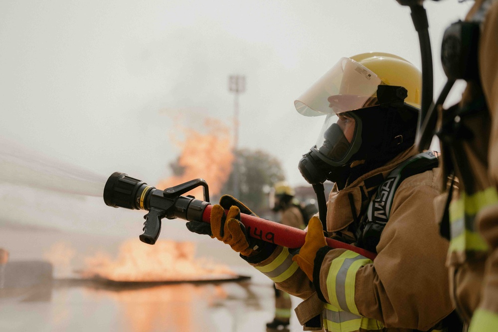 Fire Emergency Services train in live fire simulation