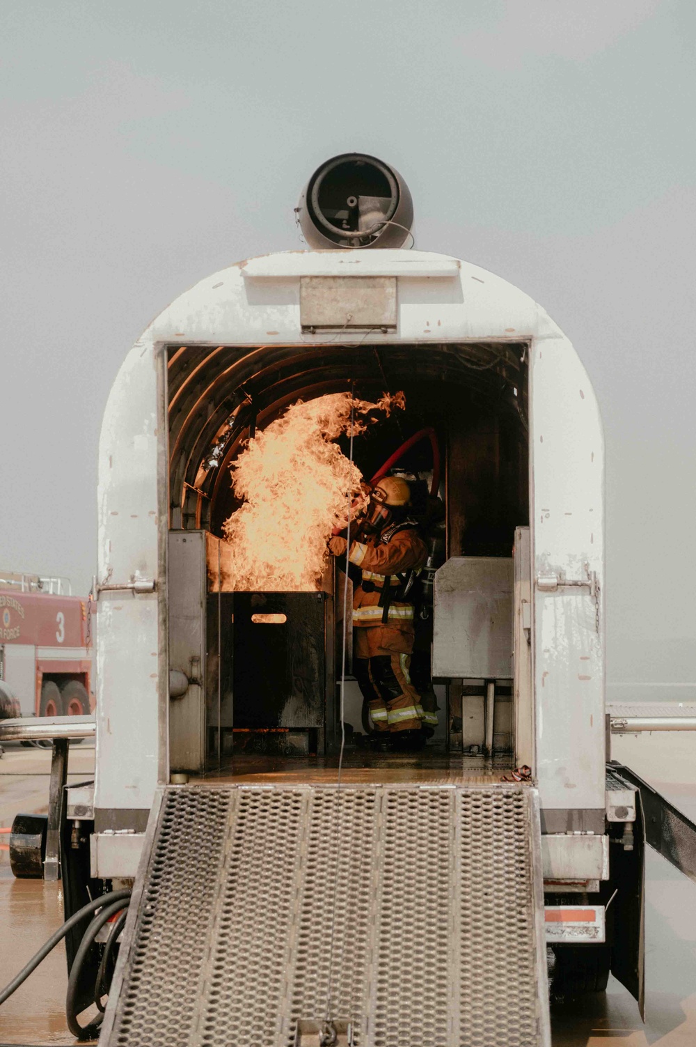 Fire Emergency Services train in live fire simulation