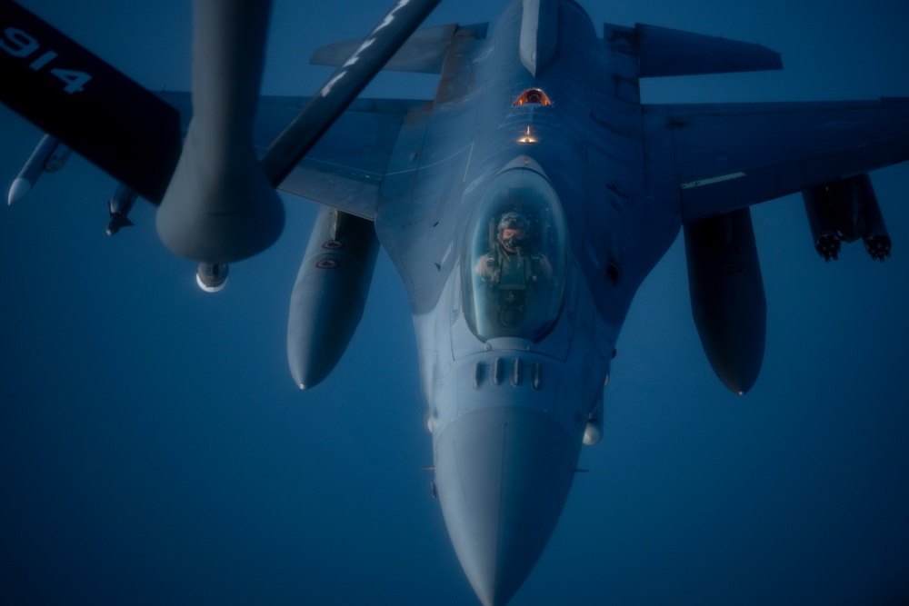 Stratotanker and Fighting Falcons Side by Side