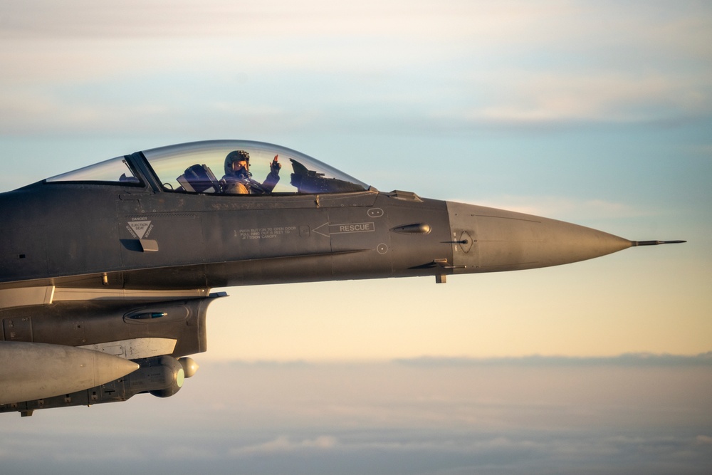 Stratotanker and Fighting Falcons Side by Side