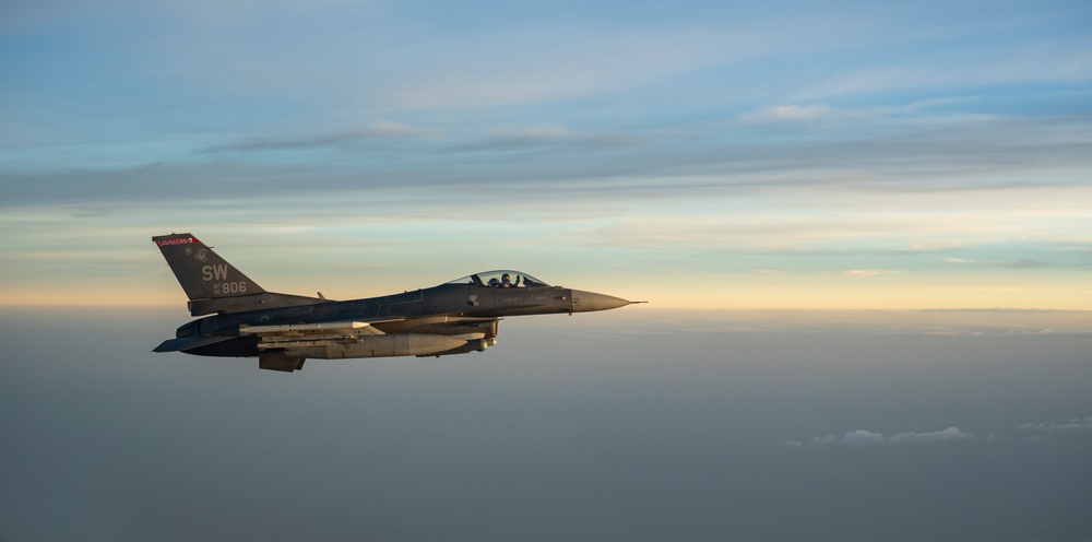 Stratotanker and Fighting Falcons Side by Side