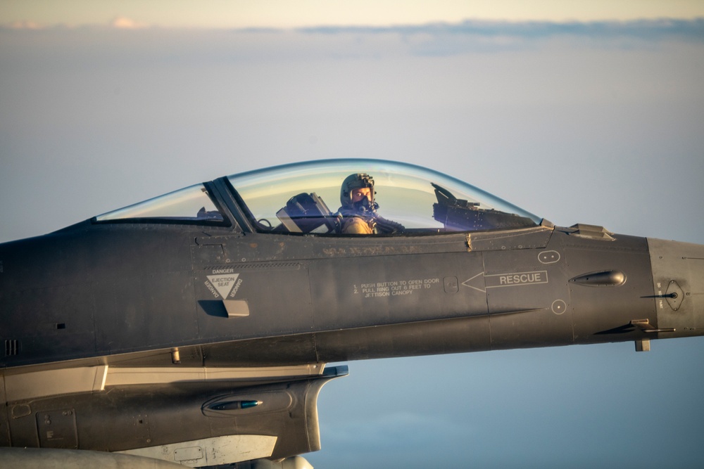 Stratotanker and Fighting Falcons Side by Side