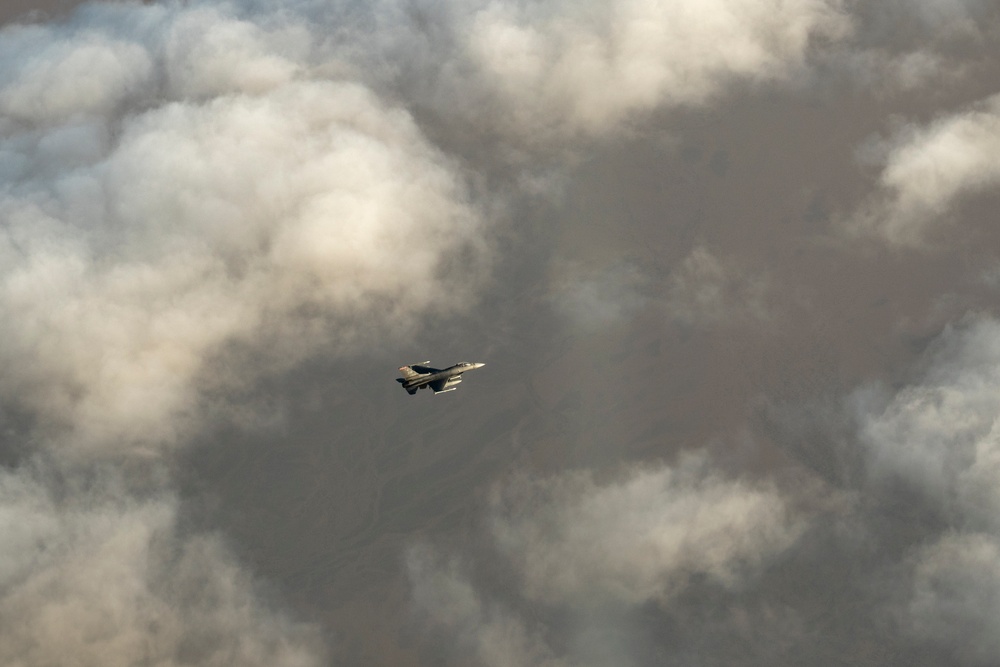 Stratotanker and Fighting Falcons Side by Side