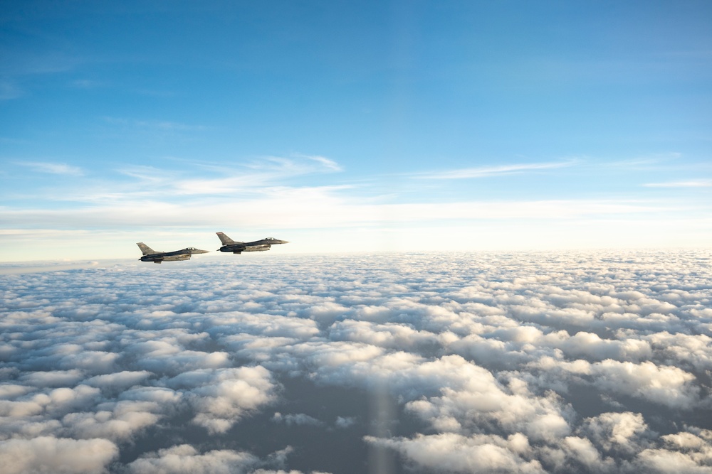 Stratotanker and Fighting Falcons Side by Side