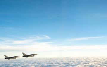 Stratotanker and Fighting Falcons Side by Side