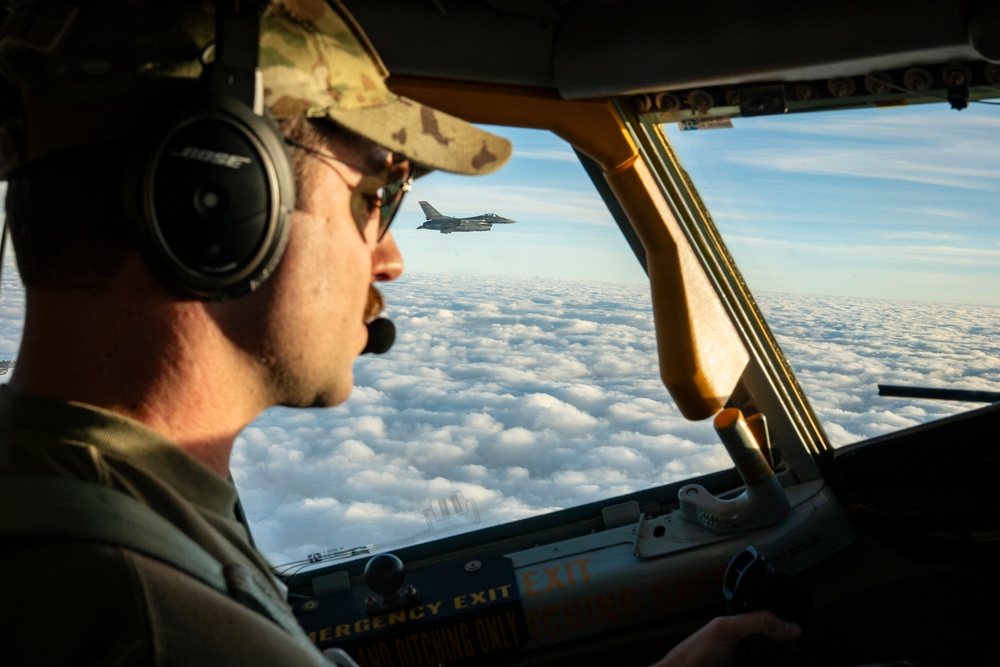 Stratotanker and Fighting Falcons Side by Side
