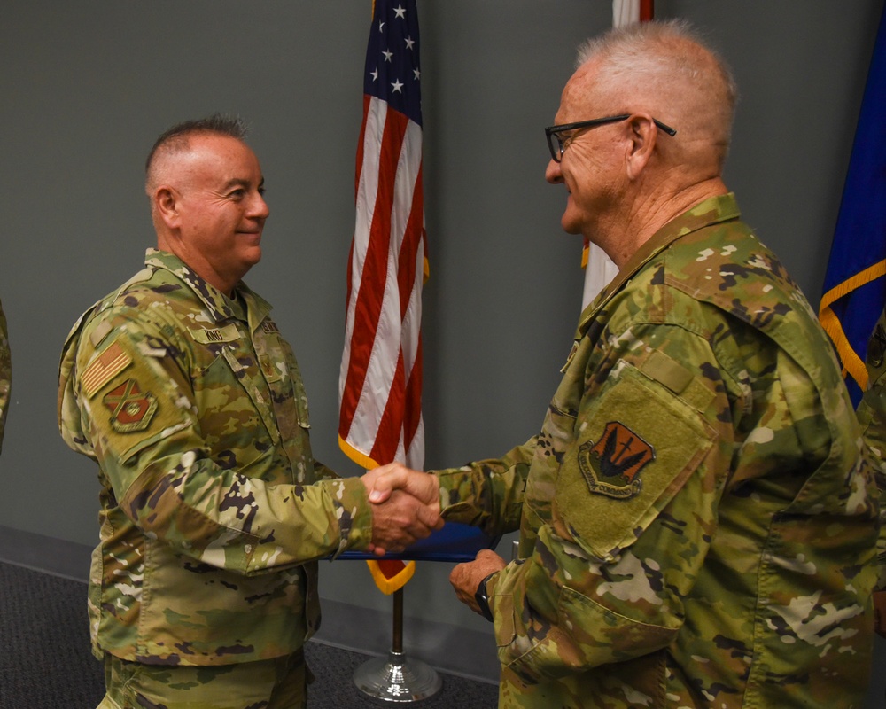 TSGT King is presented with the Air and Space Achievement Medal